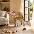 Lifestyle image of a handcrafted metal elephant sculpture with painted finish – a unique painted metal decoration perfect for vintage home decor and artistic interiors.