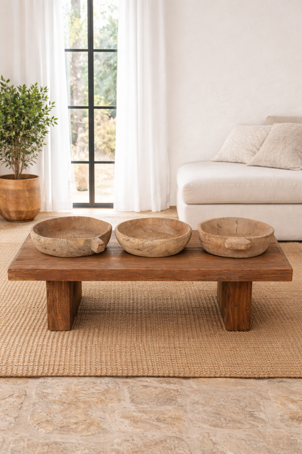 Life style imagination of a hand-carved old teak wood plate with traditional Indian motifs and rustic finish, ideal for vintage home decoration and Indian home decor.