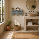 Lifestyle image of a hand carved mango wood wall shelf with distressed vintage finish, 90cm.