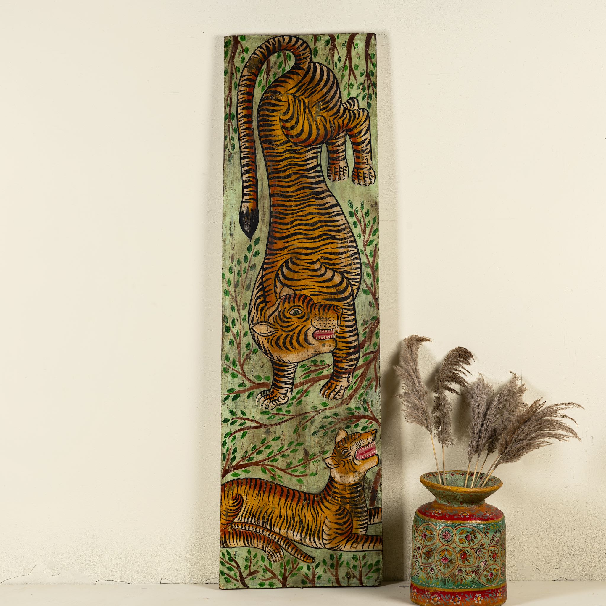Hand-painted Indian teak wall panel featuring a vibrant tiger motif on reclaimed antique wood, handcrafted by artisans in Rajasthan for unique cultural wall décor.