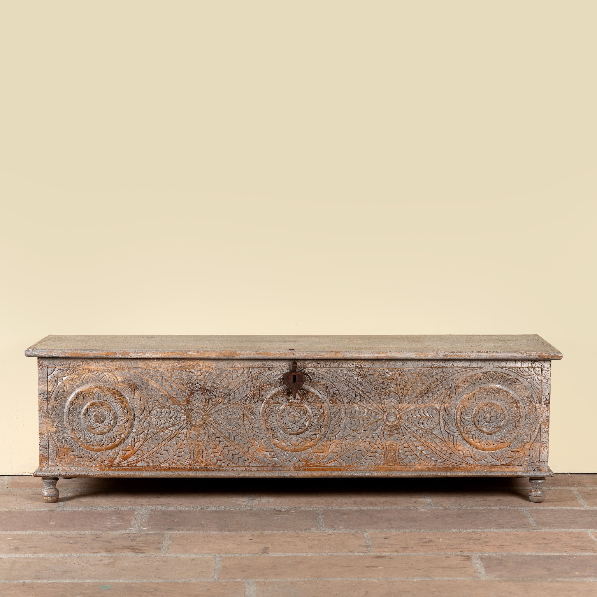 Harivansh hand carved mango wood chest with floral design and distressed vintage finish 180cm