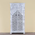 Image of a white-washed hand-carved wooden wardrobe made of solid mango wood, vintage furniture with Mediterranean Ibiza style, 180 × 90 × 40 cm.