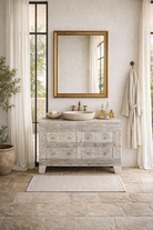 Lifestyle imagintion of a of a handcrafted chest of drawers Hemali made from reclaimed wood, featuring four carved drawers with circular motifs and a whitewashed finish. A rustic, sustainable furniture piece with soft texture and elegant detailing.