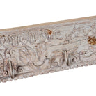 Close up image of a Heritage Hook Rack handcrafted from an antique Indian reclaimed wood architectural element with hand-carved floral details, bleached finish and seven iron hooks, 155x10x5cm.