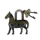 Handcrafted heart-shaped brass lock with engraved details and keys, a decorative brass accessory inspired by traditional Indian home accessories.