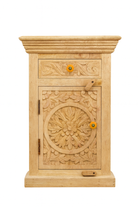 White background image of a pair of hand-carved nightstands made of sandblasted mango wood with floral Mediterranean patterns and one drawer – Hriday bedside tables by Om Home & Garden