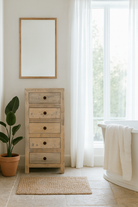 Lifestyle imagination of a chest of 5 drawers made from reclaimed wood with rustic finish; Ibiza style sustainable furniture, 50 × 35 × 110 cm.