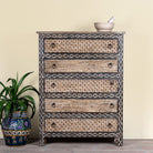 Image of a hand painted beige-black wooden chest of 5 drawers in vintage style.