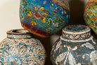 Hand-painted papier-mâché vases from India with floral folk-art designs in vibrant mixed colours. Unique Indian decor and decorative art objects handcrafted using traditional methods.