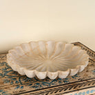 Hand-carved white marble plate with floral petal design, ideal for Indian home decor and vintage home decoration.