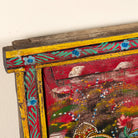 Close up image of a Radha and Krishna antique reclaimed wood mirror with hand-painted Indian artwork on an authentic vintage reclaimed wooden mirror frame, 50x50x5cm.