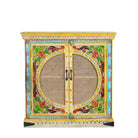 White background image of a hand-painted, hand-carved cupboard made of mango wood with floral design and rattan inserts.