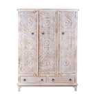 White background image of a hand carved creme colour mango wood wardrobe wit 2 drawers and 4 shelfs and ample storage.