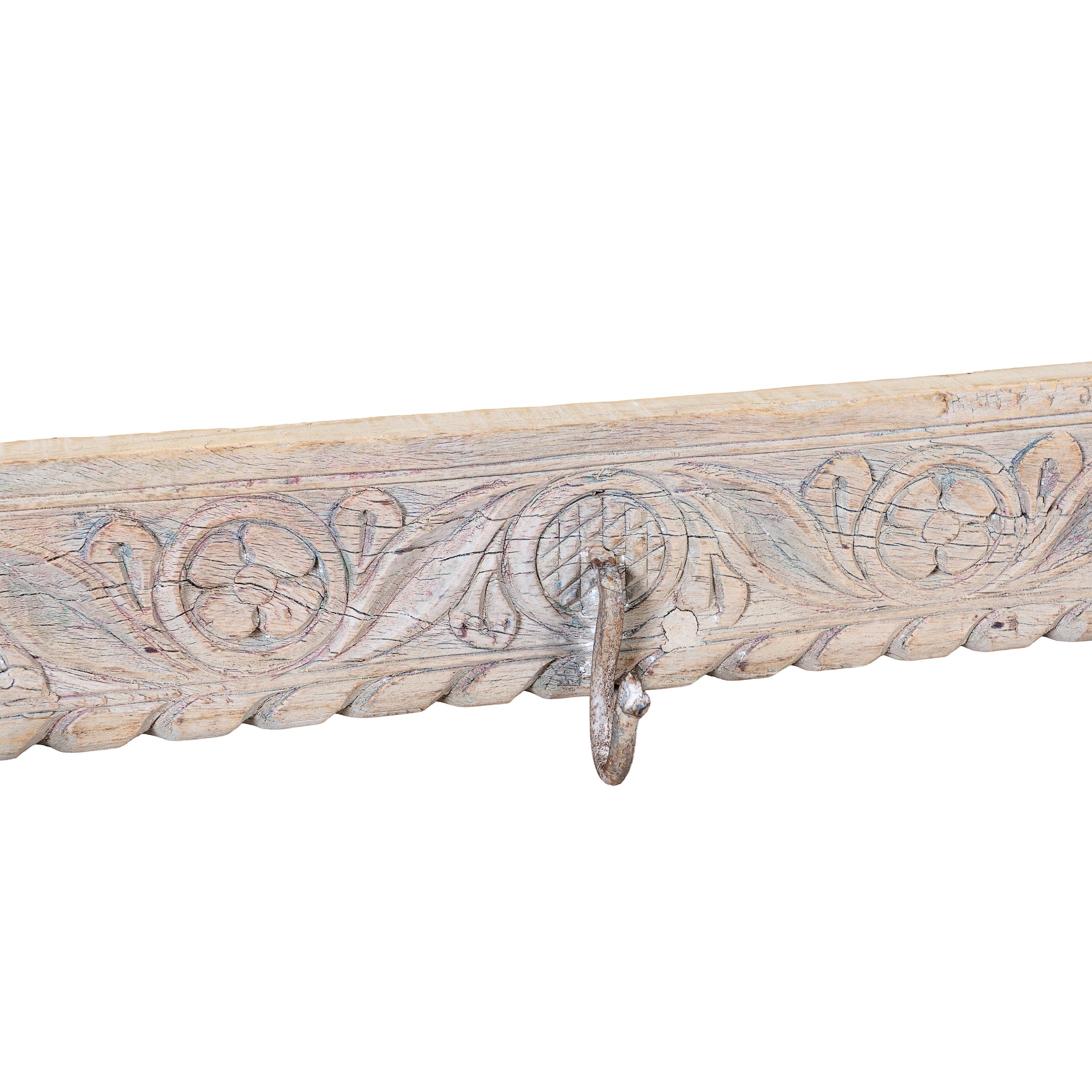 Close up image of a Jaipur Wall Hook Rack handcrafted from an antique Indian reclaimed wood architectural element with hand-carved floral details, bleached finish and seven iron hooks, 150x7x5cm.