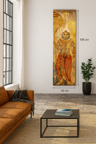 Lifestyle scene with a hand-painted vintage door panel measuring 54x3x195 cm, depicting the powerful figure of Lord Hanuman holding a golden mace, adorned in traditional attire with intricate jewellery, set against a distressed wooden background for an aged, sacred appearance.
