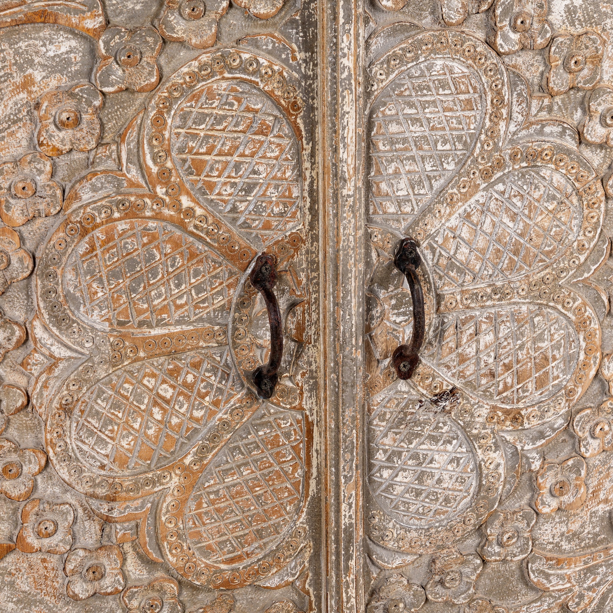 Close up image of a square carved wood sideboard with whitewashed floral detailing; ideal as living room furniture, 90 × 90 × 40 cm.