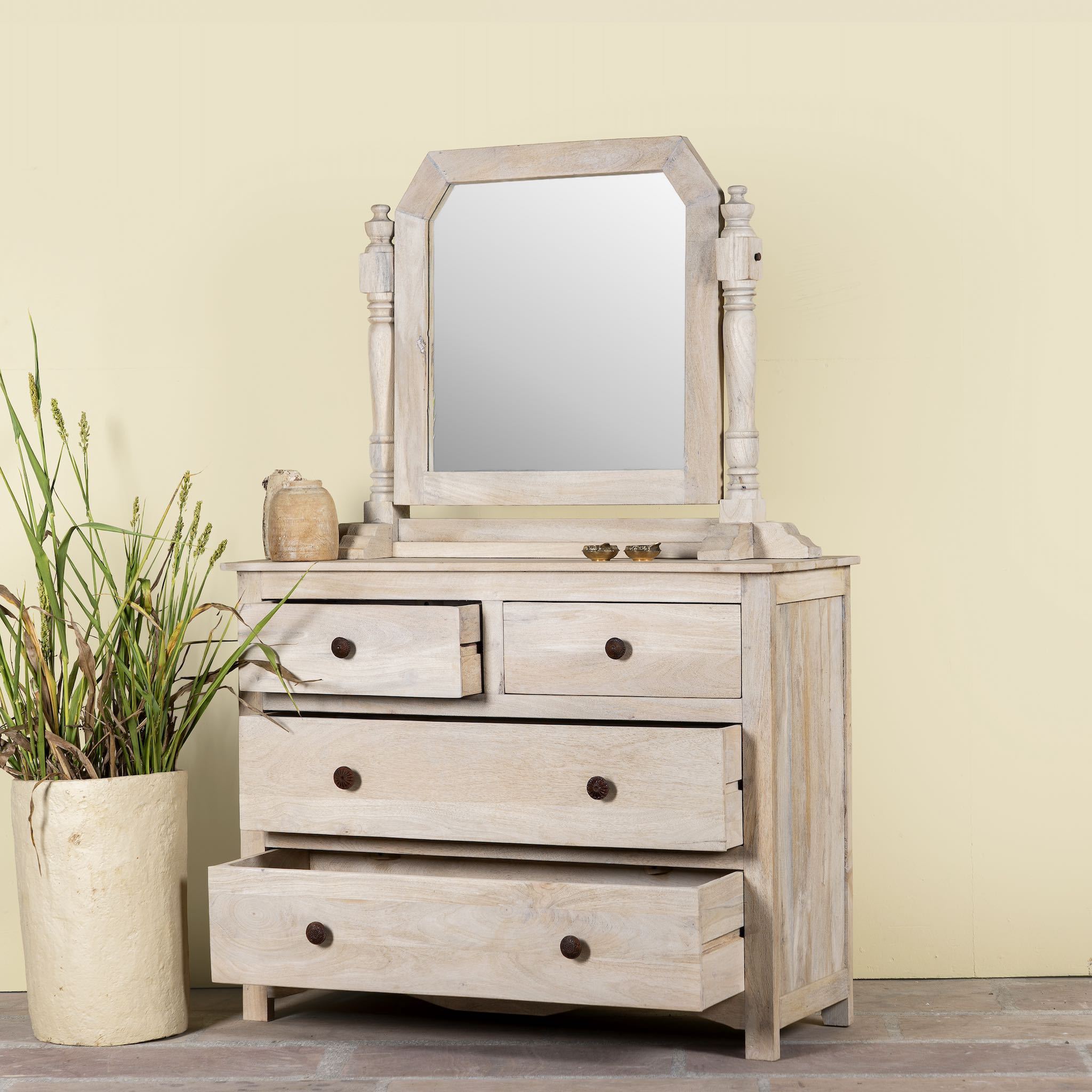 Open drawer image of a Ibiza style Mango wood dressing table with five drawers and mirror, sandblasted whitewashed finish, 100 × 40 × 130 cm.