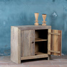 Side angle with open door image of a rustic cupboard made of reclaimed wood with two doors, sustainable bathroom furniture, 90 × 40 × 86 cm.
