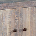 Close up image of a rustic cupboard made of reclaimed wood with two doors, sustainable bathroom furniture, 90 × 40 × 86 cm.