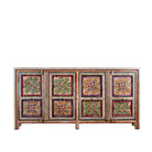 White background image of a boho style hand painted sideboard with reclaimed old Indian door decoration. Unique cabinet with floral design.