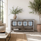 Lifestyle image of a hand painted console table with 2 doors and plenty of inside storage made of reclaimed old wood in Boho style.