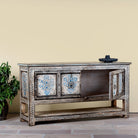 Side angle image with open doors of a hand painted console table with 2 doors and plenty of inside storage made of reclaimed old wood in Boho style.