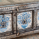 Close up image of a hand painted console table with 2 doors and plenty of inside storage made of reclaimed old wood in Boho style.