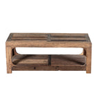 White background view of a driftwood coffee table made from reclaimed wood with rustic finish and open lower shelf; sustainable furniture, 120 × 60 × 40 cm.