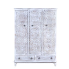 White background image of a white washed hand carved wardrobe made of mango wood in floral design with 2 drawers and ample inside storage.