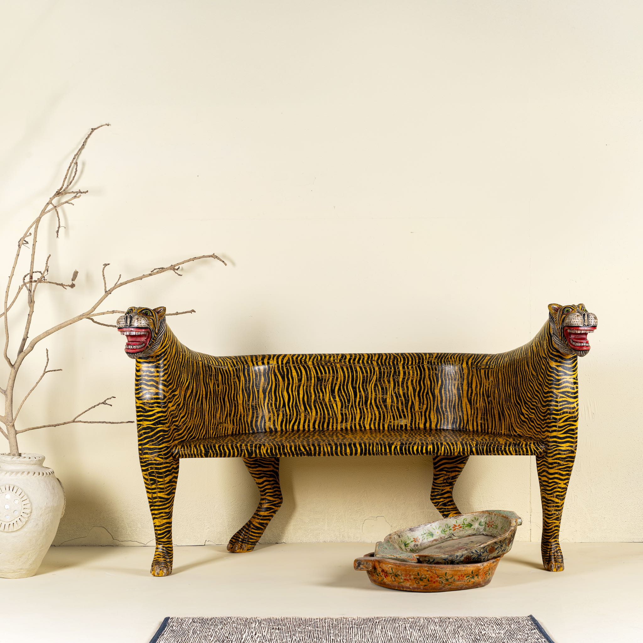 Hand-painted Tiger bench with double tiger heads and hand-painted stripes; unique furniture made from reclaimed teak, 160 × 70 × 90 cm.