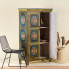 Open door image of a hand painted wardrobe made of reclaimed wood with floral motifs; unique furniture for bedrooms or living rooms, 90 × 45 × 150 cm.