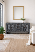 Lifestyle imagination of a of a hand-painted black and white sideboard made of reclaimed wood – Kaira model by Om Home & Garden