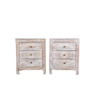 White background image of a set of two hand carved night stands in solid mango wood with mandala motifs; white washed furniture, 50 × 40 × 60 cm.