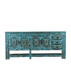 White background image of a Kalpana reclaimed wood console table with blue distressed finish, carved doors, three drawers, enclosed storage and open lower shelf.