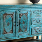 Close up image of Kalpana antique console table wood with turquoise patina, part of our teakwood tables collection.