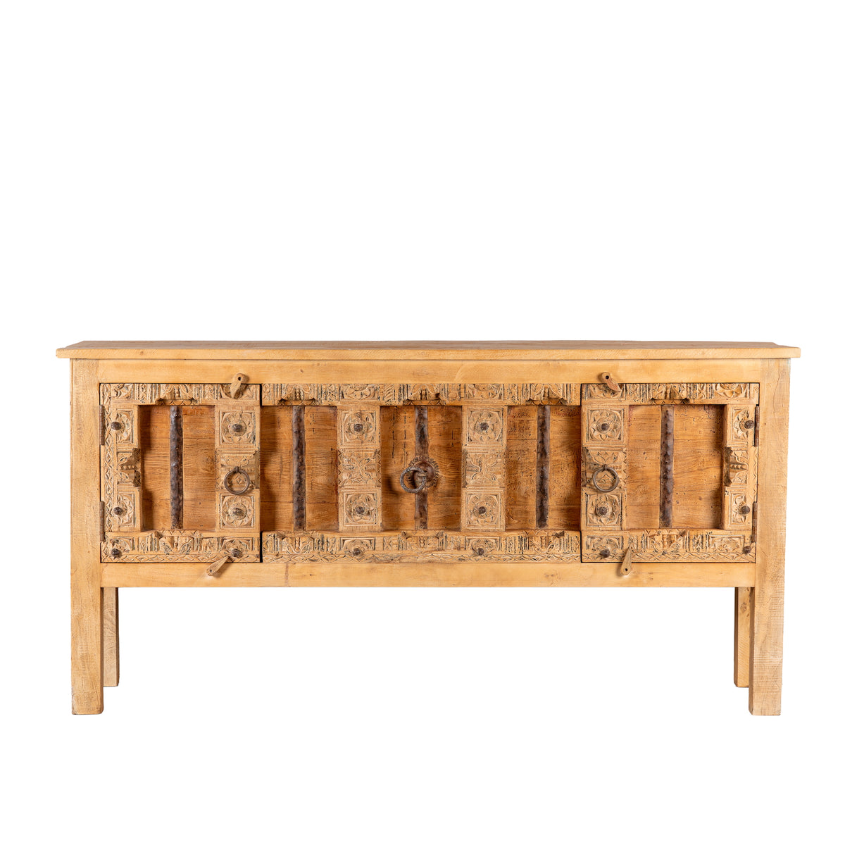 White background image of a Kanan console table made from old teak door panels, featuring traditional hand-carved details, iron ring accents, and built-in storage in a natural rustic finish.