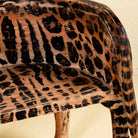 Close up view of a hand painted cat chair made of reclaimed wood, a unique decorative furniture not only for a children room. The head of the chair can be purchased in right or left direction.