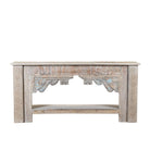 White background image of a Karam reclaimed teak console table with hand-carved Indian details, lower shelf, and vintage whitewashed finish.