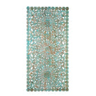 White background image of a hand-carved mango wood wall panel with floral motifs in blue finish – Kataee Blue model by Om Home & Garden