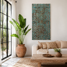 Lifestyle scene with a hand-carved mango wood wall panel with floral motifs in blue finish – Kataee Blue model by Om Home & Garden