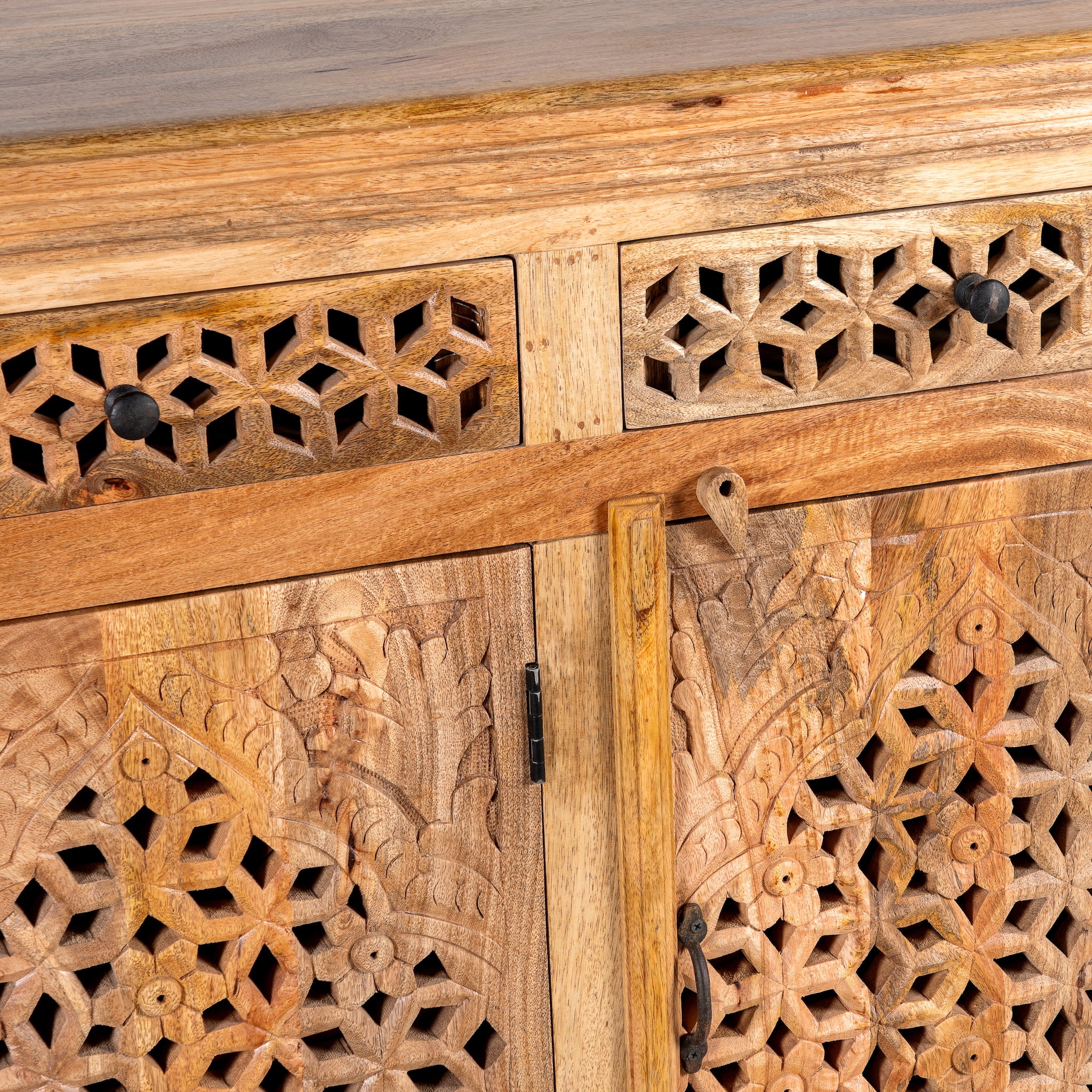 Close up image of a hand-carved mango wood sideboard Kaveri with 6 compartments and 3 drawers, oriental-inspired mango wood furniture, 150 × 90 × 40 cm.