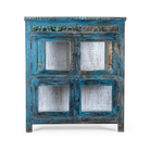 White background image of a Kavish vintage blue reclaimed teak wood wardrobe with peacock reverse glass paintings and distressed Indian finish.