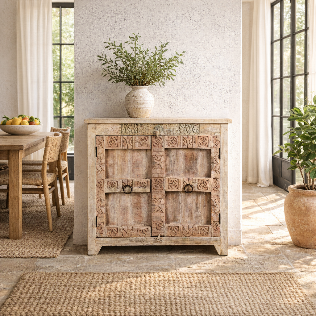 Lifestyle image of a whitewashed reclaimed teak sideboard in Ibiza style, featuring sandblasted old wood surfaces and rustic design; 112 × 90 × 50 cm.