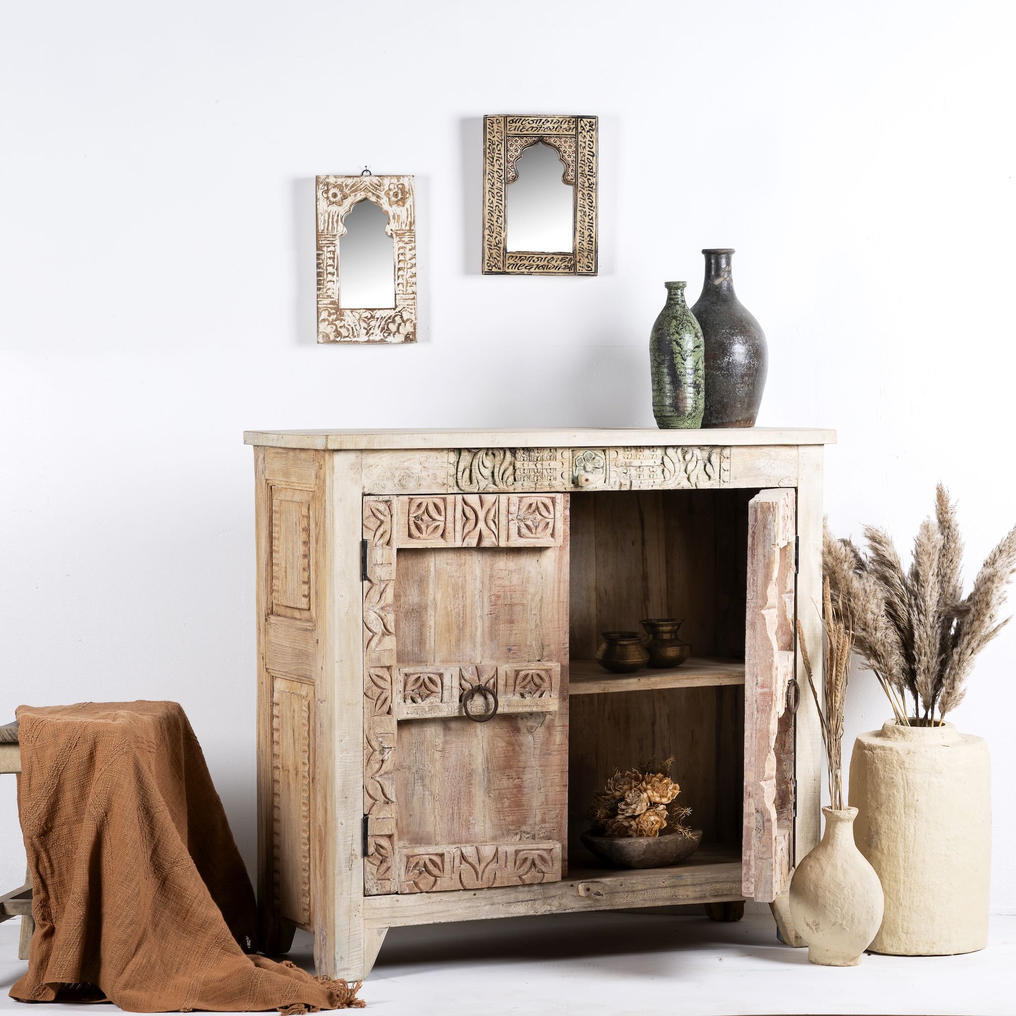 Side angle image with open door of a sandblasted reclaimed teak sideboard in Ibiza style, featuring sandblasted old wood surfaces and rustic design; 112 × 90 × 50 cm.