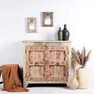 Image of a sandblasted reclaimed teak sideboard in Ibiza style, featuring sandblasted old wood surfaces and rustic design; 112 × 90 × 50 cm.