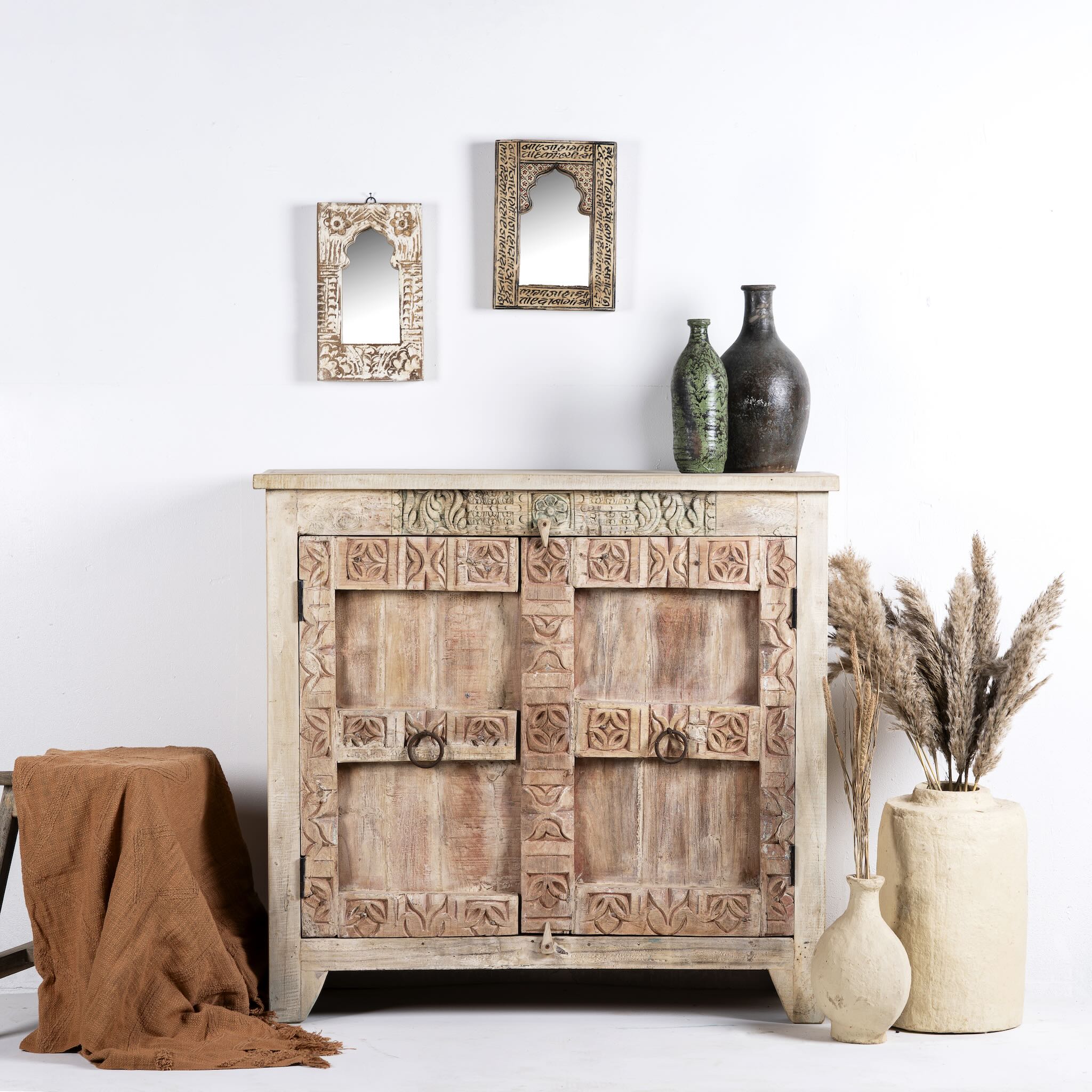 Image of a sandblasted reclaimed teak sideboard in Ibiza style, featuring sandblasted old wood surfaces and rustic design; 112 × 90 × 50 cm.