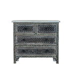 White background image of a of a hand-painted Indian chest of drawers made from recycled wood – unique furniture featuring colourful motifs and antique craftsmanship.