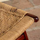 Close up image of a Keya solid acacia wood chair with handwoven natural seagrass seat and backrest 95cm