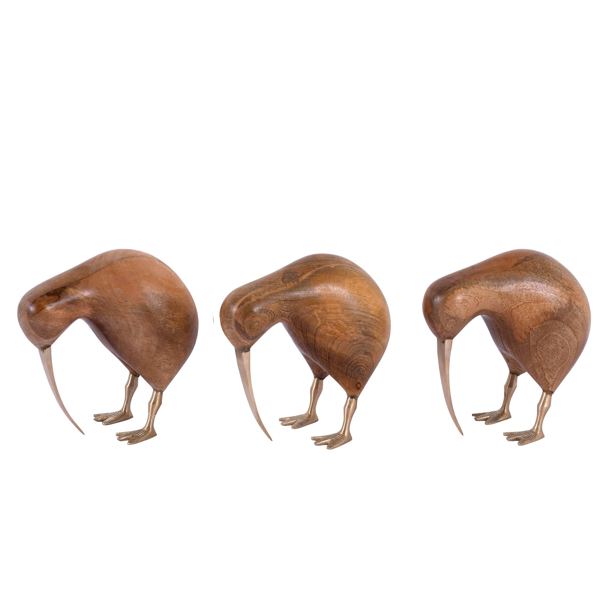 White background image of a handcrafted wooden kiwi bird sculpture Kiwi Grande with brass feet and beak. A vintage home accessory and unique Indian decoration ideal as a statement piece in vintage home decor.