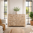 Lifestyle Imagination of a hand-carved mango wood cabinet with three drawers and vintage distressed finish; ideal for mango wood furniture lovers and vintage home decor, 150 × 110 × 40 cm.